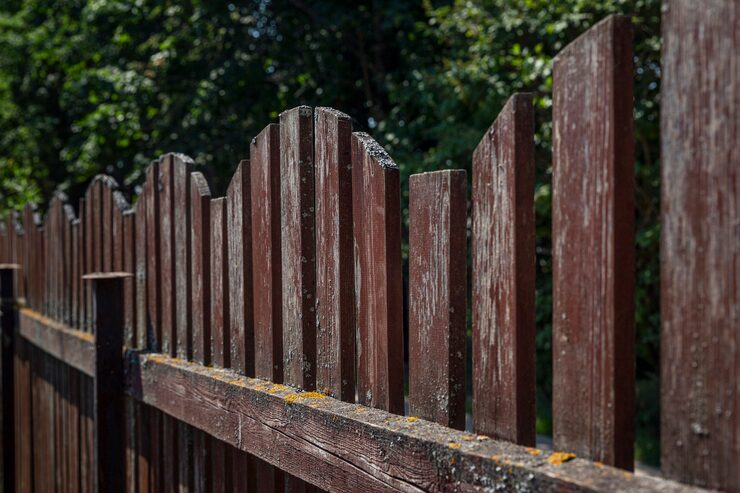 old-brown-wooden-fence-side-view-close-up_120897-2897